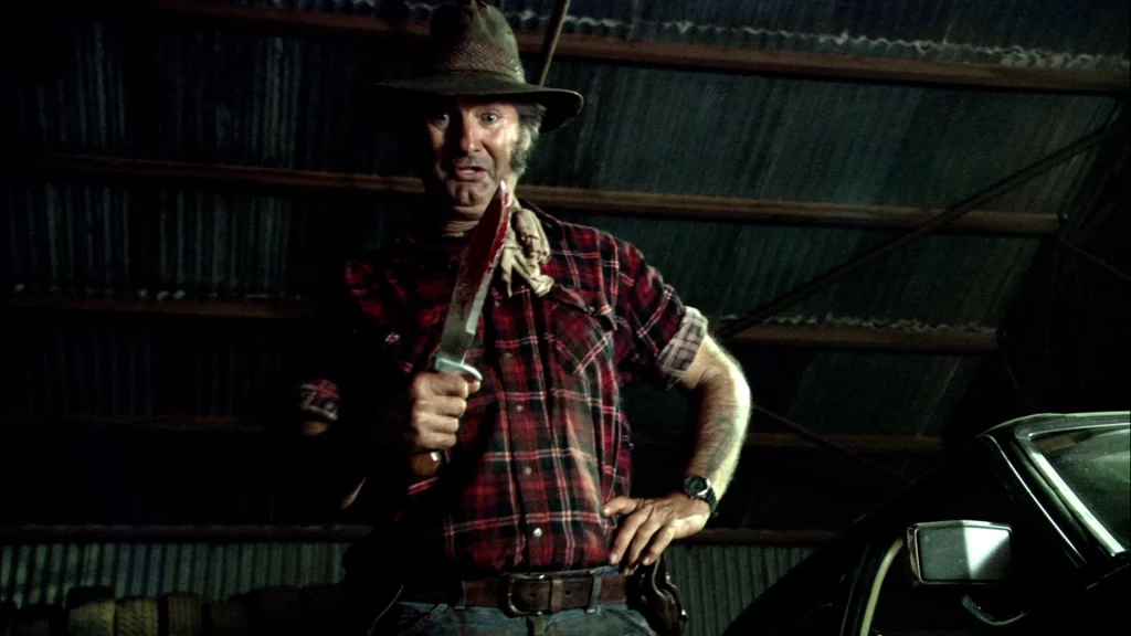 John Jarratt als Mick Taylor aus Wolf Creek 2005 von Greg McLean