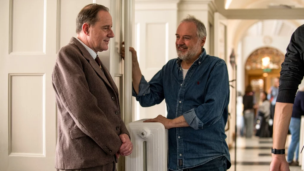 Stefan Kurt als Dr. Bohnenblust und Regisseur Stefan Haupt am Set von Stiller