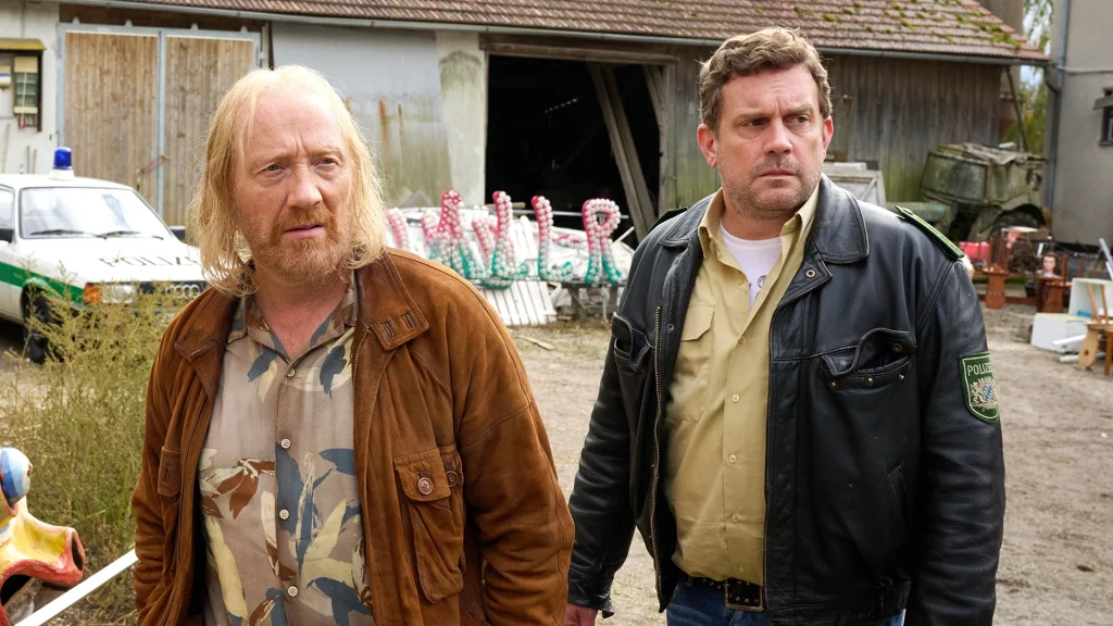 Sebastian Bezzel als Franz Eberhofer und Simon Schwarz als Rudi Birkenberger aus Steckerlfischfiasko
